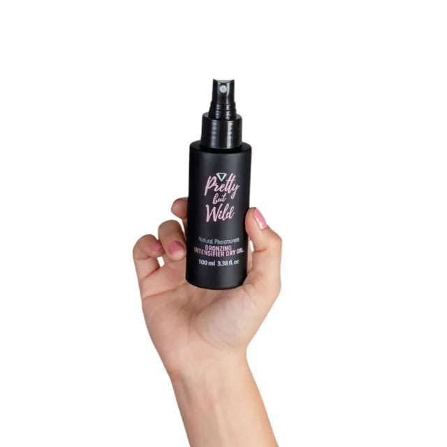 Ulei uscat cu feromoni SECRET PLAY Pretty But Wild - Bronzing Intensifier Dry Oil. cu efect de bronzare. 100 ml