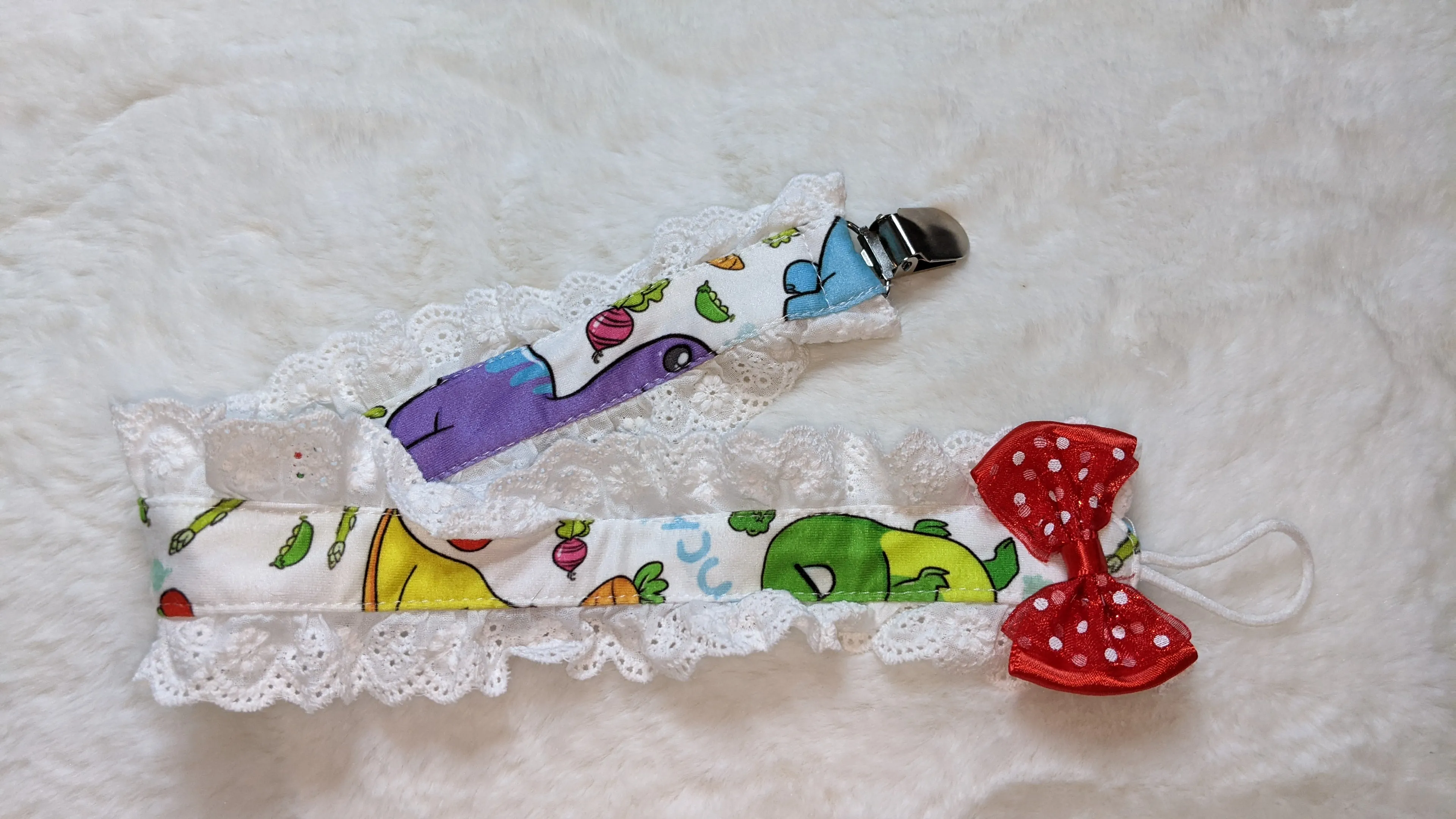Veggisaurus Dinosaur Plush Ruffle Deluxe Pacifier Clip